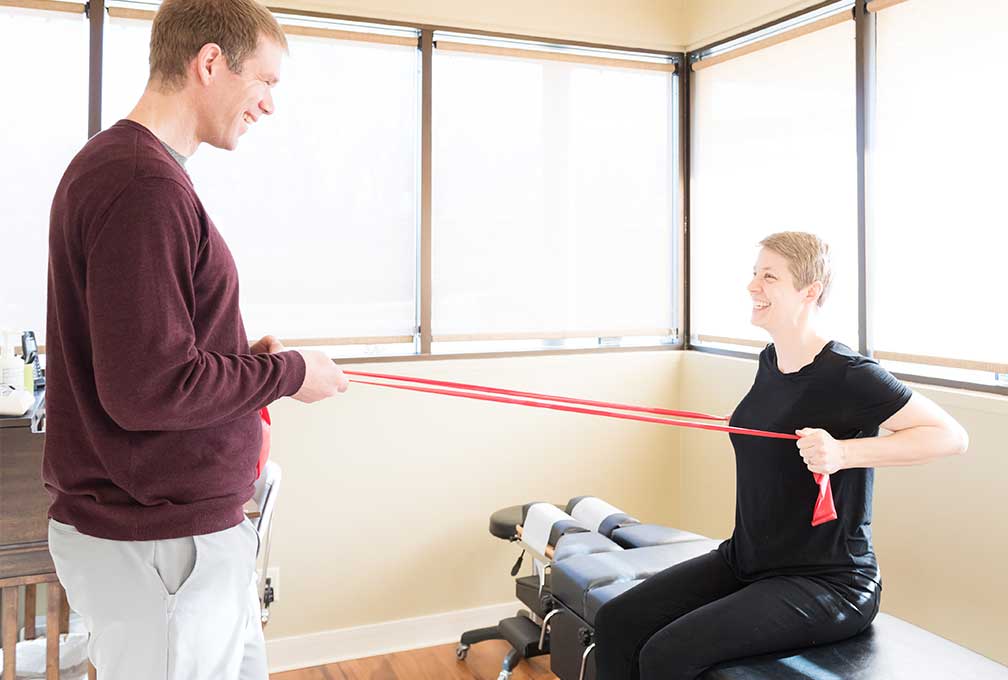 Functional-Rehabilitation-St-Peter-MN Patient performing corrective exercises for functional rehabilitation at Rising Sun Chiropractic in St. Peter, MN
