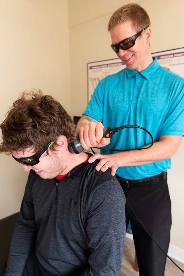 Neck pain treatment using rehabilitation-focused laser therapy in St. Peter, MN