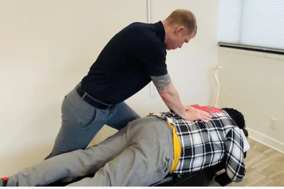 Back pain treatment using rehabilitation-focused chiropractic care in St. Peter, MN