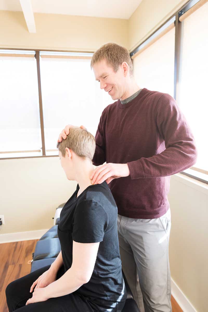 Chiropractic adjustment at Rising Sun Chiropractic in St. Peter, Minnesota